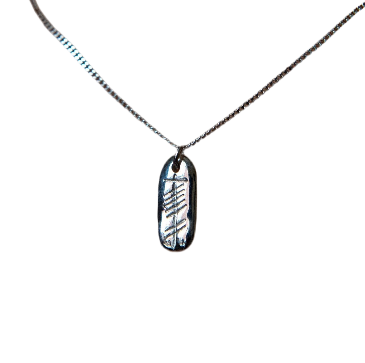 Love (carved silver pendant)