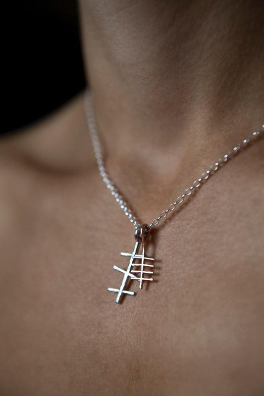 Mam necklace with gold initial on model -oghamtreasure.com