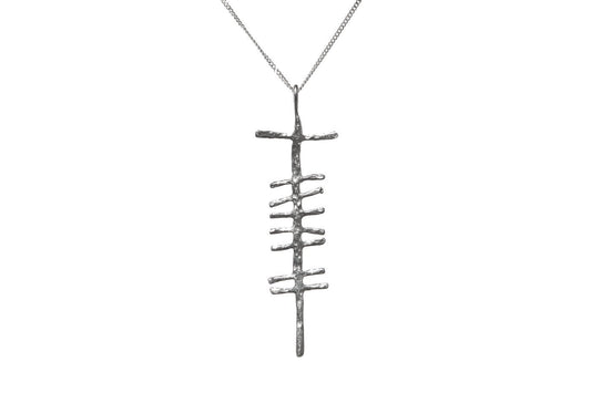 Love rustic silver pendant on white background