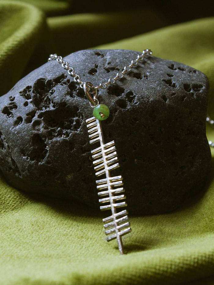 Ireland gem silver pendant on a black stone