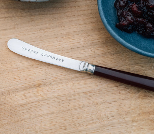 Spread Laughter vintage butter knife